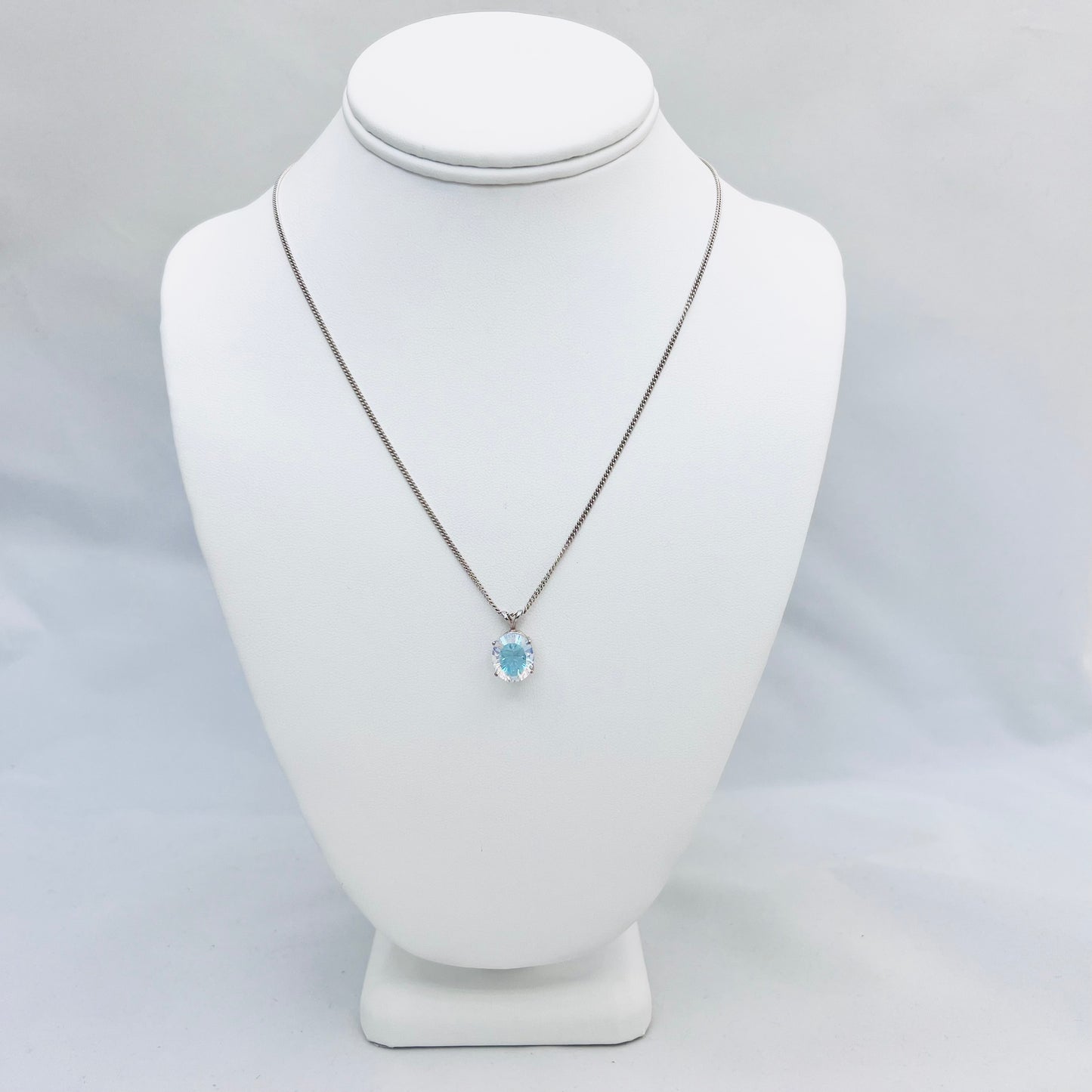 12x10mm Oval Opalescent White Quartz .925 Silver Pendant on 18" 2.0mm Curb Chain