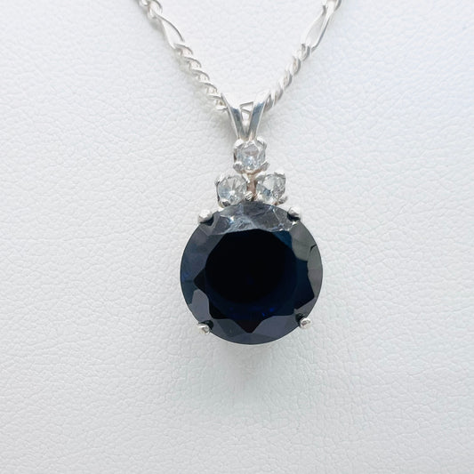 12mm Round Simulated Tanzanite Accented .925 Silver Pendant on 1.8mm 18" Figaro Chain